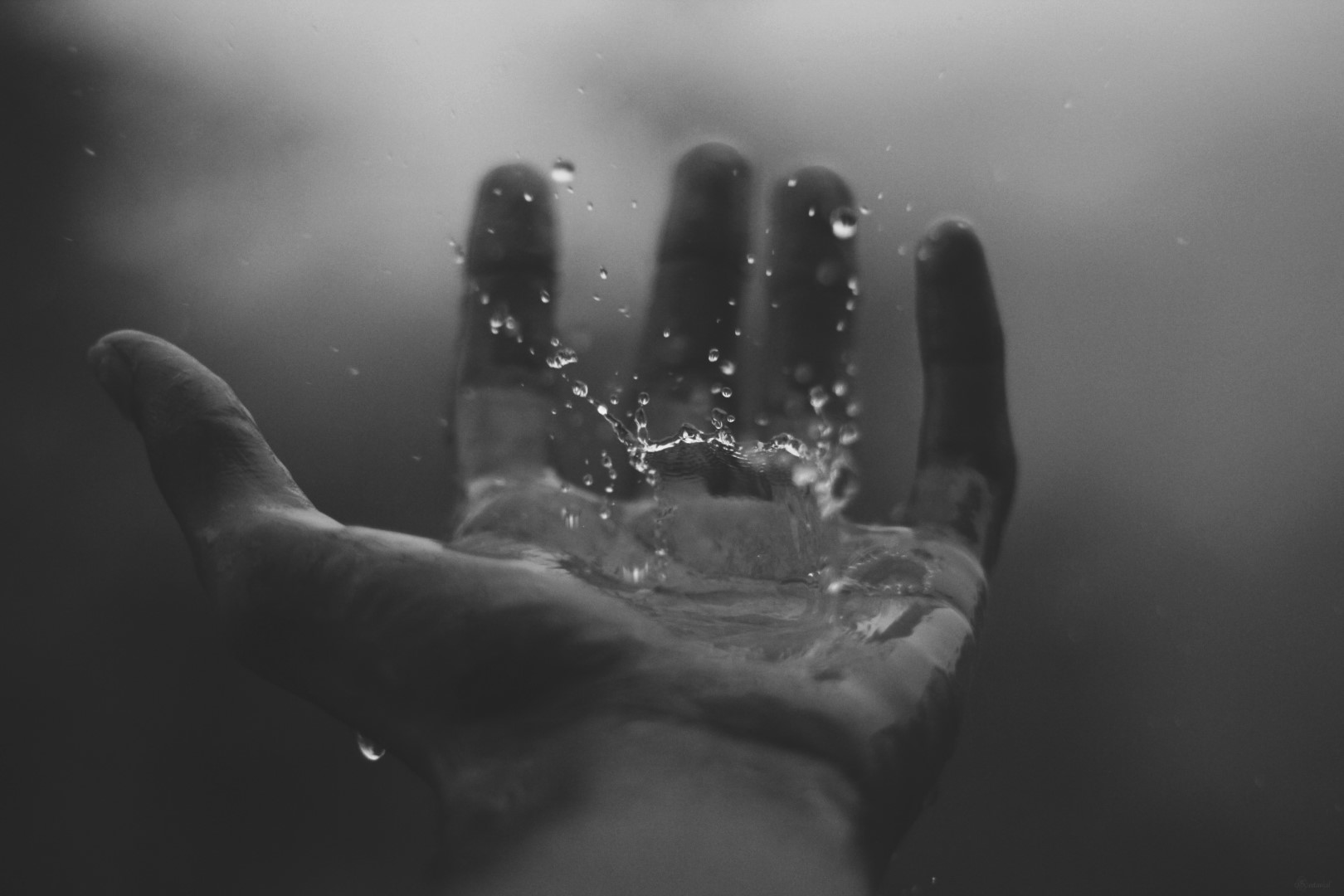 Hand with Splashing Water