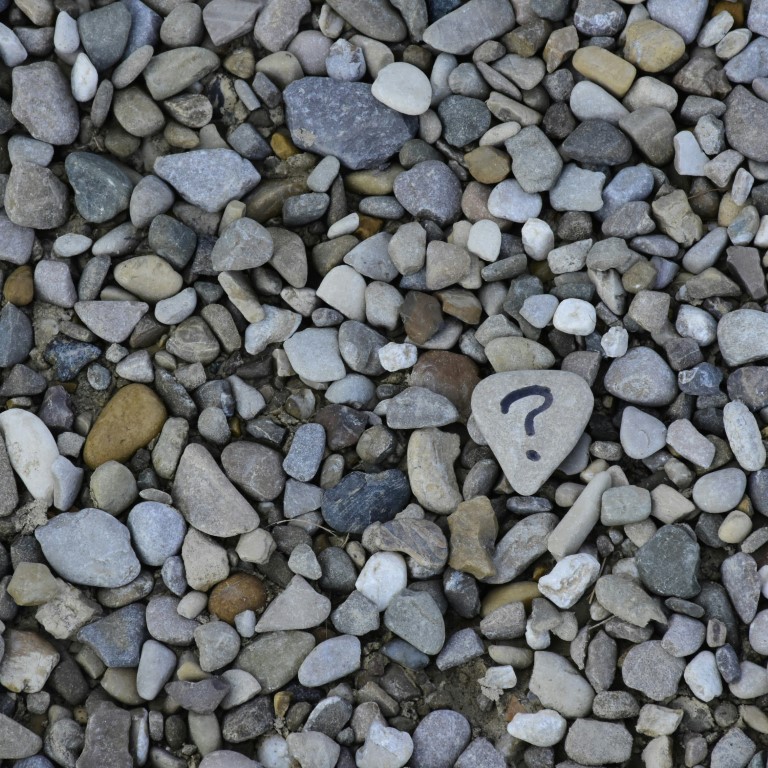 Group of Stones with Question Mark